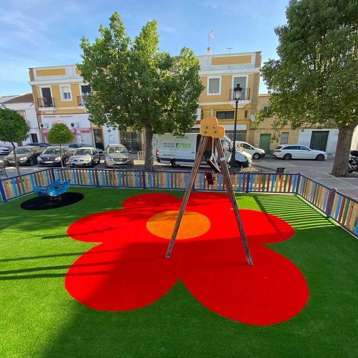 Flor de colores bajo el área de juego